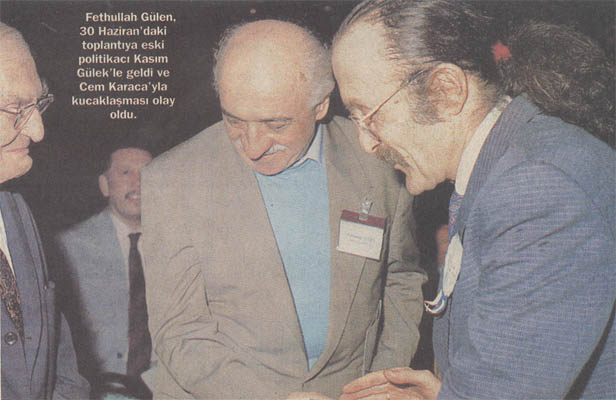 With Cem Karaca, a late pop-singer, in the opening ceremony of the Journalists and Writers Foundation in 1994